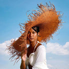 AMORA Oversized Frayed Straw Hat In Burnt Caramel Sun Hats