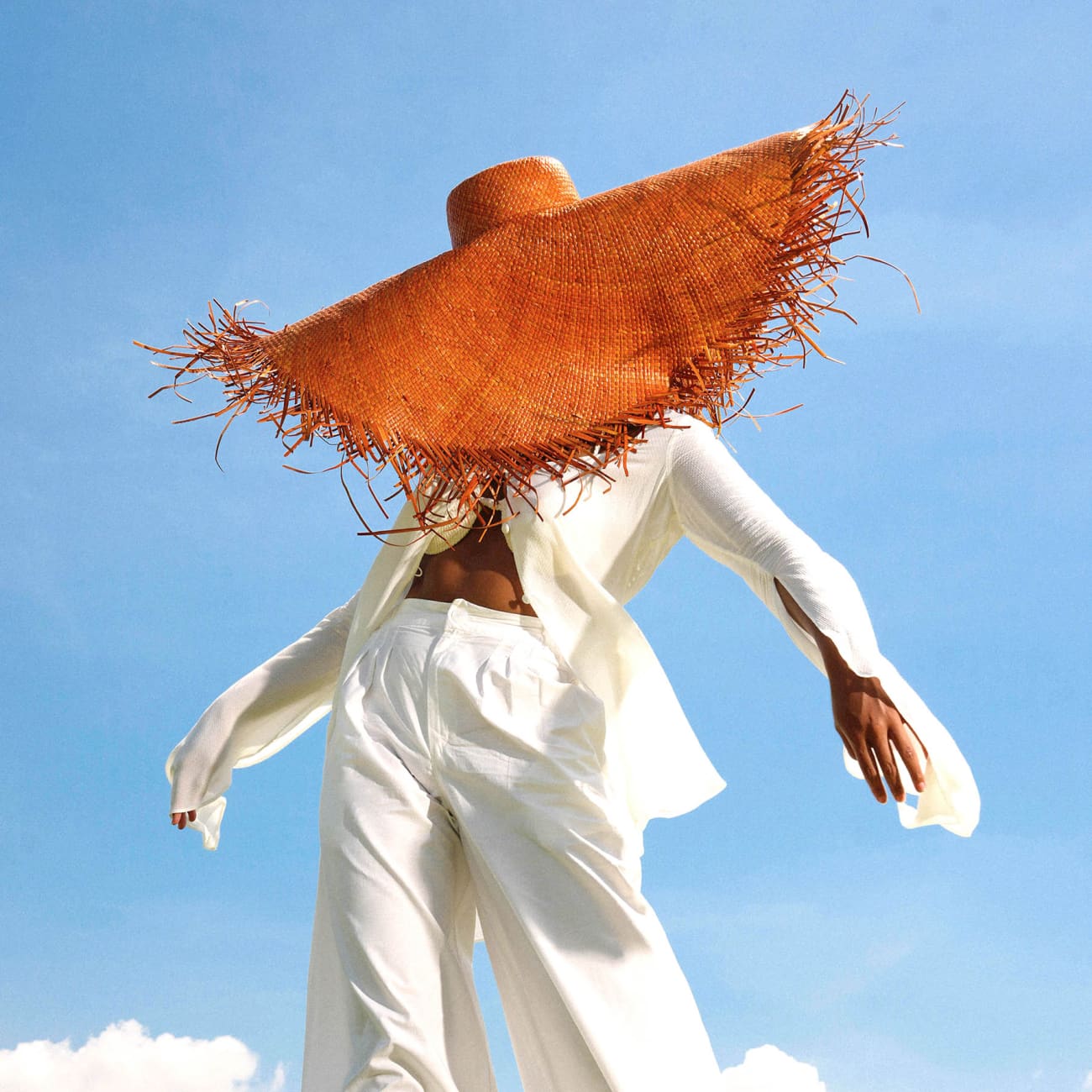 AMORA Oversized Frayed Straw Hat In Burnt Caramel Sun Hats