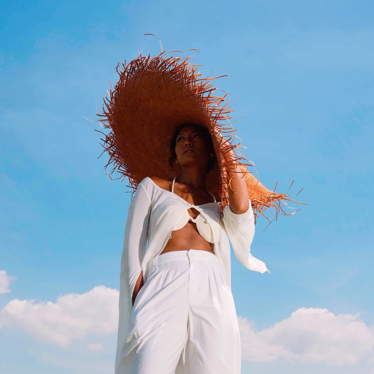 AMORA Oversized Frayed Straw Hat In Burnt Caramel Sun Hats